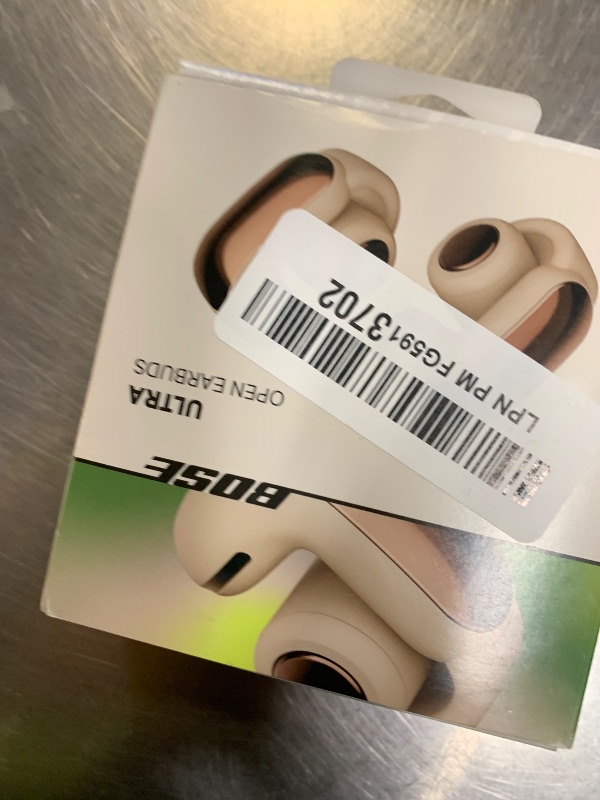 Photo 1 of Bose Ultra Open Earbuds - Bluetooth Open Ear Earbuds with OpenAudio for Awareness, Clip-On Design for Comfort, Water Resistant, Up to 48 Hrs of Playtime, Driftwood Sand - Limited Edition Color