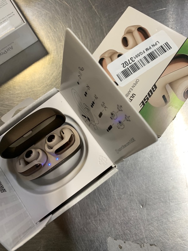 Photo 1 of Bose Ultra Open Earbuds - Bluetooth Open Ear Earbuds with OpenAudio for Awareness, Clip-On Design for Comfort, Water Resistant, Up to 48 Hrs of Playtime, Driftwood Sand - Limited Edition Color