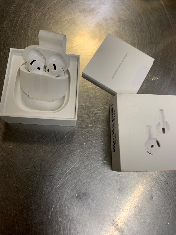 Photo 1 of Apple AirPods 4 Wireless Earbuds, Bluetooth Headphones, with Active Noise Cancellation, Adaptive, Transparency Mode, Personalized Spatial Audio, USB-C Charging Case, Wireless Charging, H2 Chip
