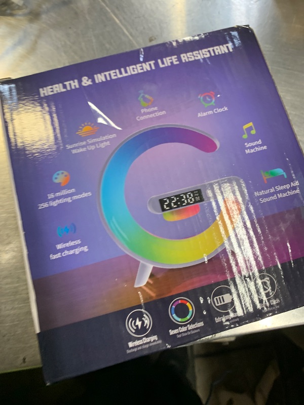 Photo 1 of Aeehuck Mini Wireless Speaker with Atmosphere Light, Wireless Charging, Alarm Clock and Bedside Lamp (Black)