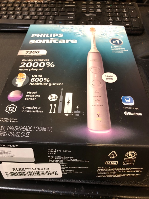 Photo 1 of Philips Sonicare 7300 Series Electric Toothbrush - Next-Generation Sonicare Technology, Pressure Sensor, 12 Brushing Settings, SmarTimer, 21-Day Runtime, Travel Case, Light Pink, HX7422/04