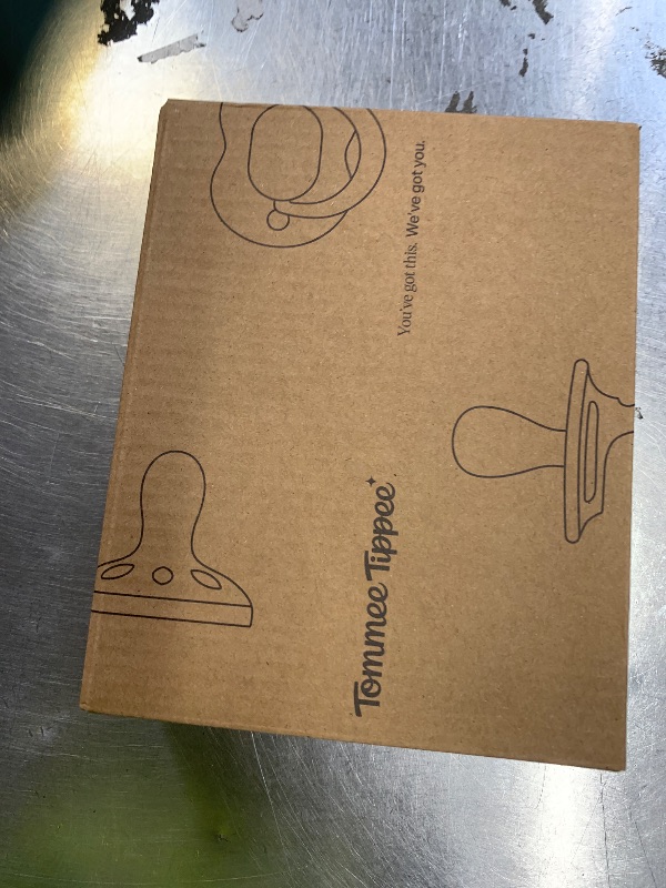 Photo 1 of Tommee Tippee Stay Put Pacifier Set, Contains 2 Ultra-Light StayPut Glow in The Dark Pacifiers and 2 Ultra-Light StayPut Pacifiers, 6-18 Months, Colors May Vary, One-Piece Silicone Design, Pack of 4