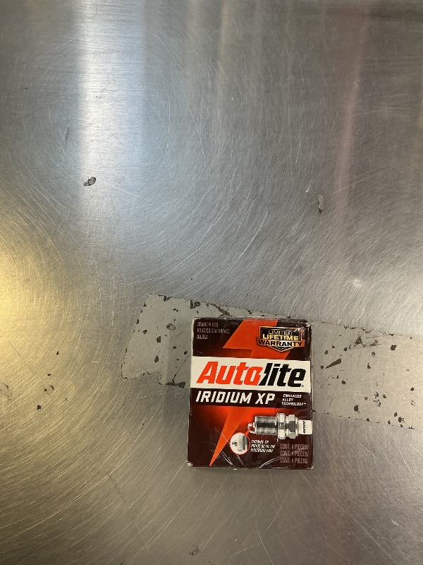 Photo 1 of **USED** Autolite Iridium XP Automotive Replacement Spark Plugs, XP5703 (4 Pack)