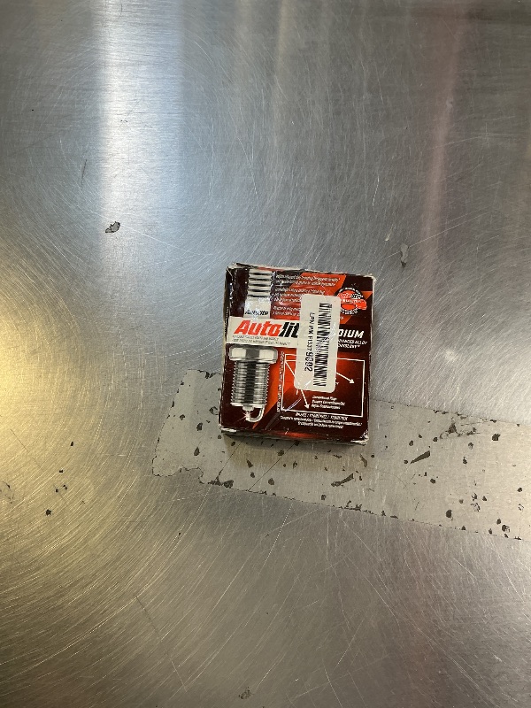 Photo 1 of **USED** Autolite Iridium XP Automotive Replacement Spark Plugs, XP5703 (4 Pack)