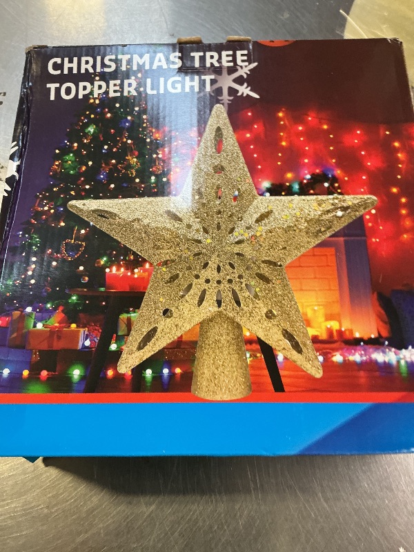 Photo 1 of 10.23 inch Christmas Star Tree Topper Projector with 6 Patterns Gold Star Christmas Tree Topper Plug in for Indoor Office Xmas New Year Holiday(Gold, 6 Patterns,3m Cable)