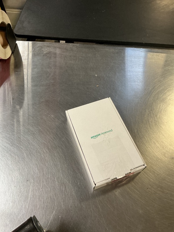 Photo 1 of Apple Watch Ultra 2 (GPS + Cellular, 49MM) - Black Titanium Case with Black Ocean Band (Renewed Premium)