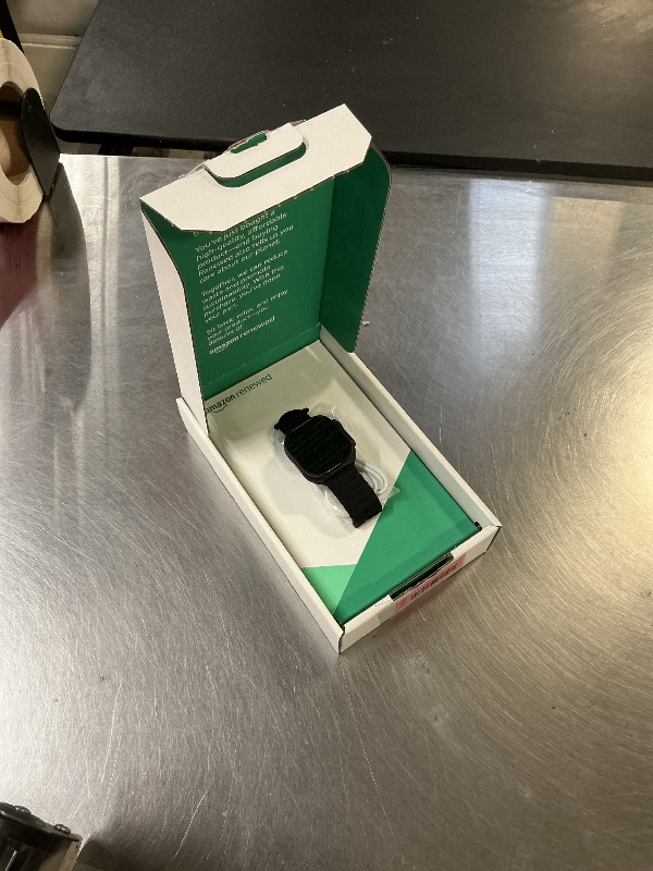 Photo 1 of Apple Watch Ultra 2 (GPS + Cellular, 49MM) - Black Titanium Case with Black Ocean Band (Renewed Premium)