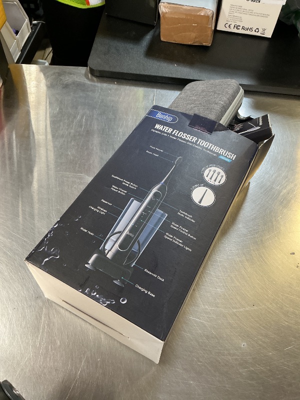 Photo 1 of Electric Toothbrush with Water Flosser – 3 Sonic Toothbrush Modes & 5 Water Flossing Pressure – Fast Charging & IPX7 Waterproof – Portable Travel Case Included, Gray