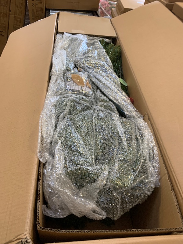 Photo 1 of National Tree Company 9 ft Pre-lit Artificial Christmas Tree, Dunhill Fir, 800 Clear Lights, 2,100 Tips, Slim Profile, Includes Stand, Green