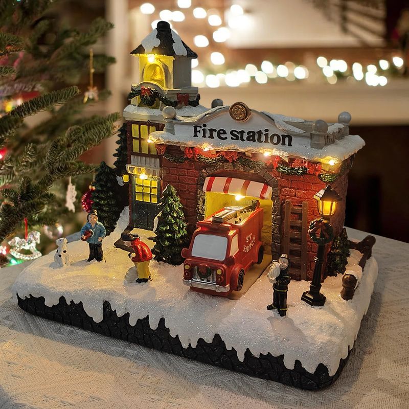 Photo 1 of Resin Christmas Village Building, Fire Station with LED Lights & Multiple Music Tracks, Collectible Buildings Decoration with Snow, Indoor Home & Desktop Holiday Gift (10" H x 11" W x 7.5" D)