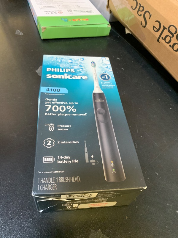 Photo 1 of Philips Sonicare 4100 Series Electric Toothbrush - Sonic Toothbrush with Advanced Sonic Technology, Pressure Sensor, Two Intensity Settings, Smartimer & Quadpacer, Black, Model HX3681/24