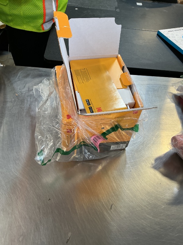 Photo 1 of Missing plug and cord---------------KODAK Dock Plus 4PASS Instant Photo Printer, 4x6” Portable Picture Printer, Bluetooth & Dock 2-in-1 Home and Gift Printer for iPhone & Android, 50 Sheets Bundle