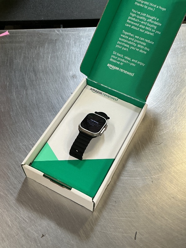 Photo 1 of Apple Watch Ultra [GPS + Cellular 49mm] Titanium Case with Midnight Ocean Band, One Size (Renewed Premium)