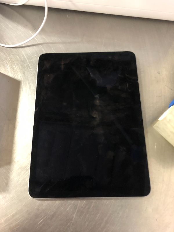 Photo 1 of iPad Air 11 inches with M3 chip Built for Apple Intelligence, Liquid Retina Display, 128GB, 12MP Front/Back Camera, Wi-Fi 6E + 5G Cellular, Touch ID, All-Day Battery Life — Gray