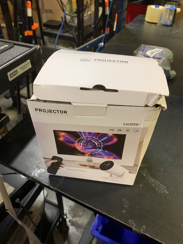 Photo 1 of ?Electric Focus?Mini Projector, Support 4K 1080P, 210 ANSI Portable Projector with WiFi and Bluetooth, Auto Keystone Correction Video Projector, Compatible with Smartphone,TV Stick,Laptop