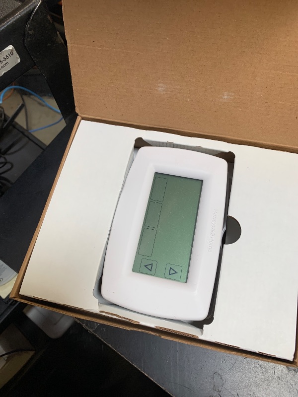 Photo 1 of Honeywell Home RTH7600D 7-Day Programmable Touchscreen Thermostat, White