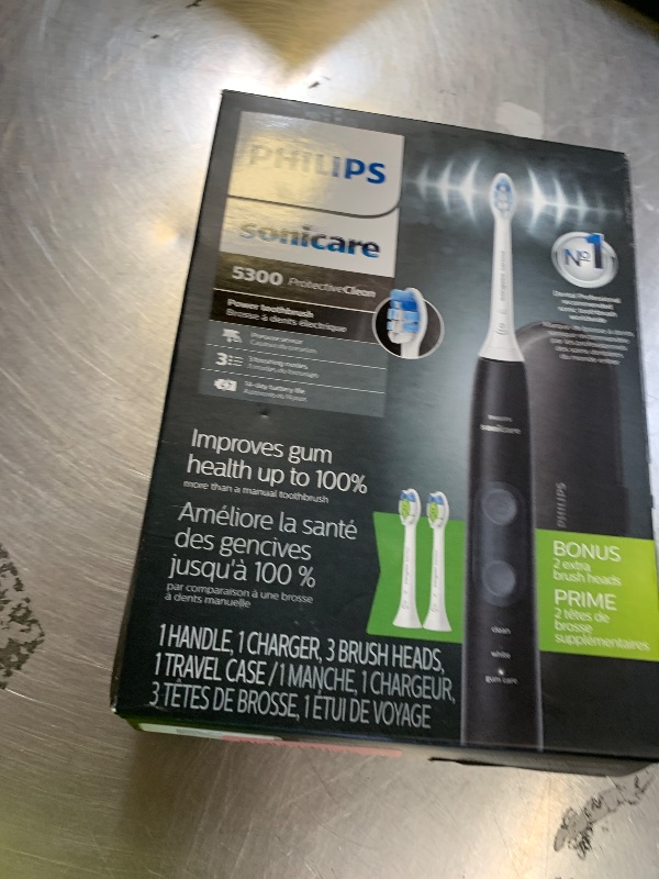 Photo 1 of Philips Sonicare ProtectiveClean 5300 Rechargeable Electric Toothbrush, with Pressure Sensor, 3 Cleaning Modes, SmarTimer and QuadPacer, with 2 Bonus Brush Heads, Travel Case, Black, Model HX6423/34