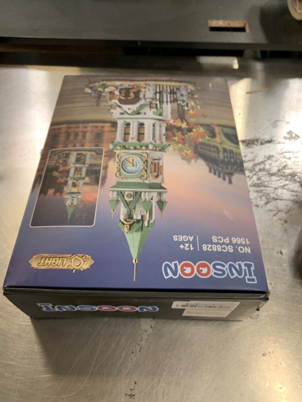 Photo 1 of INSOON Magic Clock Tower Building Set with Light, 1566 PCS Big Medieval Castle House Construction Model with Owl & Garden, Home Decor Building Block Kit, for Adults Teens Boys Girls 12+