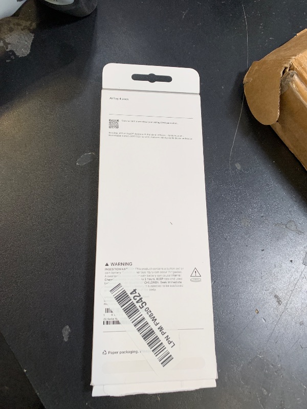 Photo 1 of **USED** SCRATCHED** Apple AirTag (1st Generation) - 4 Pack: Tracker for Keychain, Wallet, and More; Locator with Sound; Simple One-Tap Setup with iPhone or iPad; Key Finder with up to 1.5X Precision Finding Range*