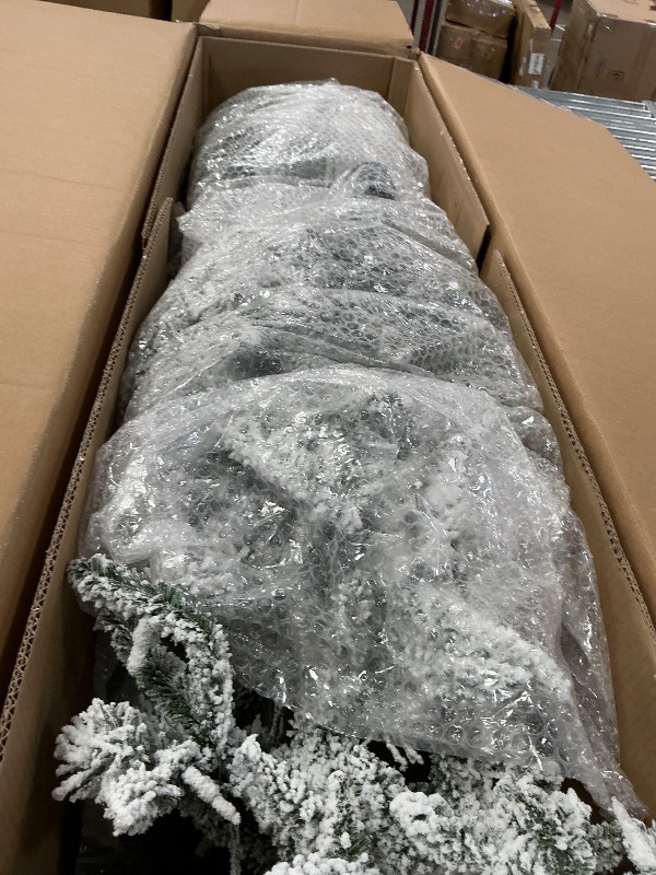 View 3 of ************INCOMPLETE ITEM, THIS IS ONLY BOX #1 OUT OF 2 TOTAL************
Fraser Hill Farm 10-Ft. Pine Valley Flocked Artificial Christmas Tree with Warm White LED Lights and Stand, Prelit Foldable Fake Tree with Realistic Snowy Foliage for Home Decorat