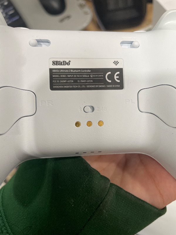 Photo 1 of ***POSSIBLY FOR PARTS/ MALFUNCTIONS DURING USE*** 8Bitdo Ultimate 2 Bluetooth Controller with TMR Joysticks, Switchable Hall Effect/Tactile Triggers, Vibration, Motion Control, RGB Fire Ring and Back Buttons for Switch/Switch 2 & Windows PC - White