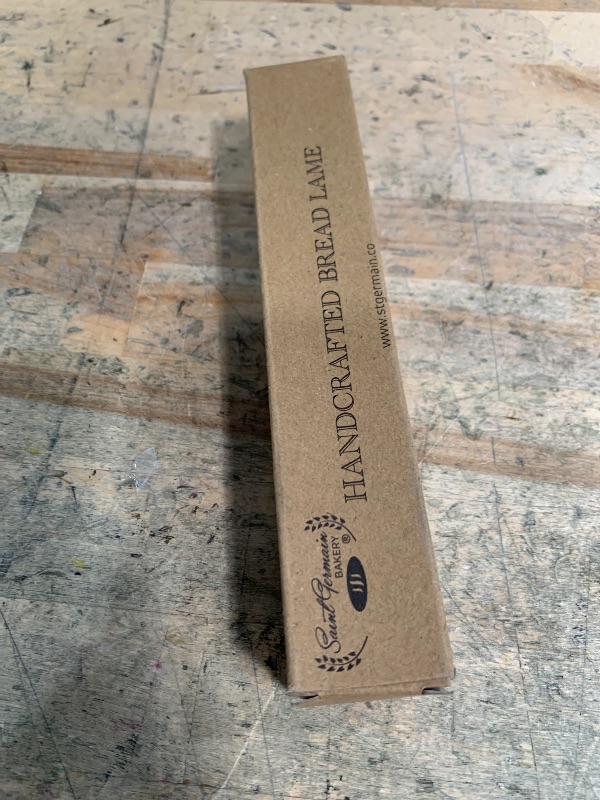 Photo 1 of "SAINT GERMAIN Premium Hand Crafted Bread Lame for Dough Scoring Knife, Lame Bread Tool for Sourdough Bread Slashing with 10 Blades Included with Replacement with Authentic Leather Protector Cover"