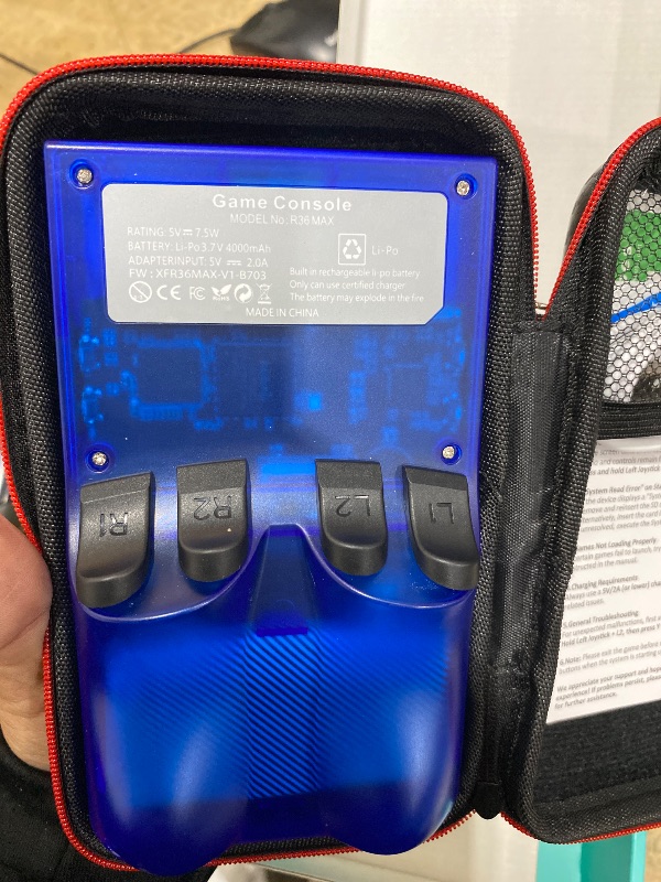 Photo 1 of ?R36MAX 4000mAh Portable Rechargeable Handheld Retro Game Console,Comfort Non-Slip Handheld Standing Retro Game Console with 64G TF Car,4.0-inch Screen,for Office,Blue