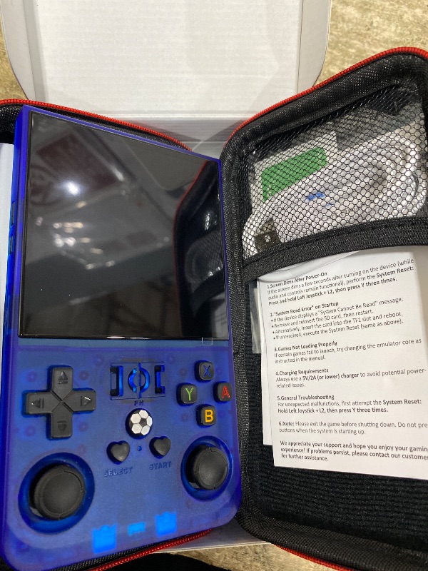 Photo 1 of ?R36MAX 4000mAh Portable Rechargeable Handheld Retro Game Console,Comfort Non-Slip Handheld Standing Retro Game Console with 64G TF Car,4.0-inch Screen,for Office,Blue