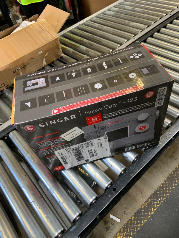 Photo 1 of SINGER® Heavy Duty 4423 (Grey) High Speed Sewing Machine + Accessories | 23 Built-In Stitches Deliver 97 Stitch Applications | 50% More Power, 1100 Stitches/Min | Metal Frame, 1-Step Buttonhole