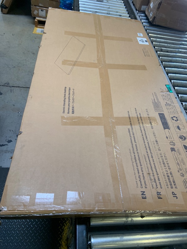 Photo 1 of INCOMPLETE**TABLE ONLY, NO LEGS** Marsail Electric Standing Desk with One-Piece Desktop, 63 x 30 Sit Stand Desk with Thickened Tabletop, Height Adjustable Stand Up Desk with Cable Management for Home Office(Frame+Desktop, 2 Packages)