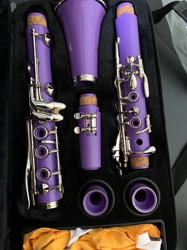 Photo 1 of Bb Clarinet For Beginners Students B Flat Clarinet 17 Keys Clarinet with Case Stand Strap 2 Barrels 8 Mouthpiece Cushion White Gloves(Purple)