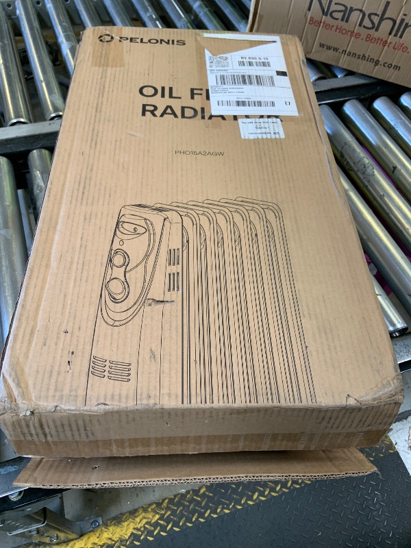 Photo 1 of PELONIS Radiator Heater for Large Space, Electric Oil Filled Radiator, Dual Knobs, 1500W, Quiet Space Heater, 3 Modes, Tip-over Protection