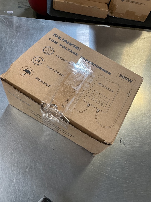 Photo 1 of SUNVIE 300W Low Voltage Transformer with Timer and Photocell Sensor Landscape Lighting Transformer Waterproof 120V to 12V/14V AC Outdoor Low Voltage Transformers for Landscape Pathway Lights Spotlight