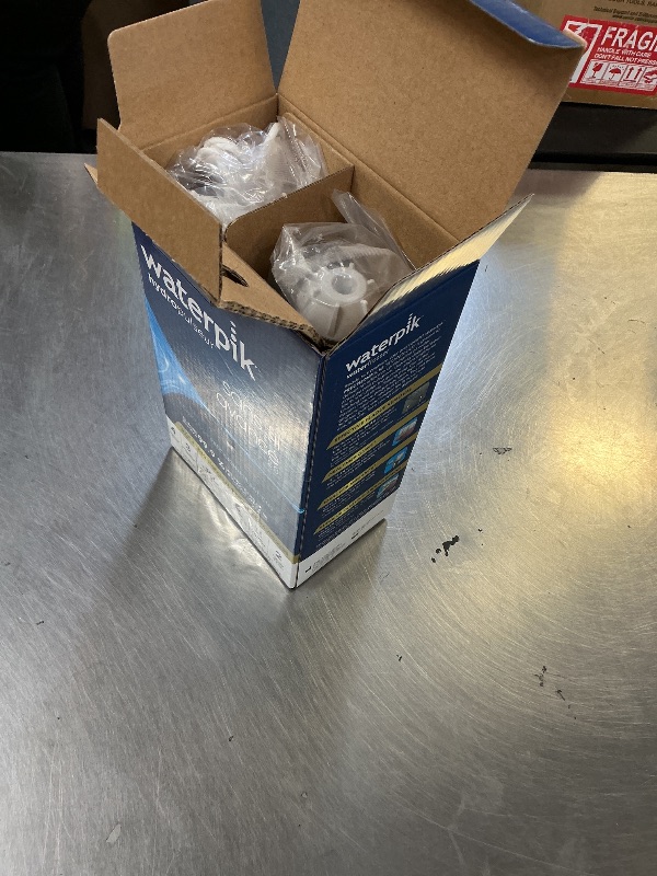 Photo 1 of Waterpik Cordless Advanced 2.0 Water Flosser For Teeth, Gums, Braces, Dental Care With Travel Bag and 4 Tips, ADA Accepted, Rechargeable, Portable, and Waterproof, White WP-580, Packaging May Vary