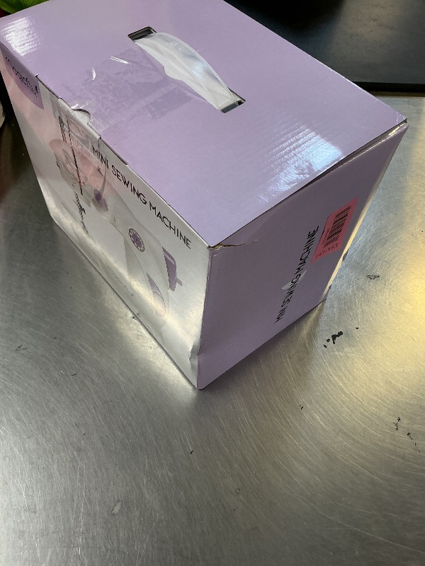 Photo 1 of Magicfly Mini Sewing Machine with Extension Table, Dual Speed Portable Sewing Machine for Beginners with Light, Sewing Kit for Household Use, White