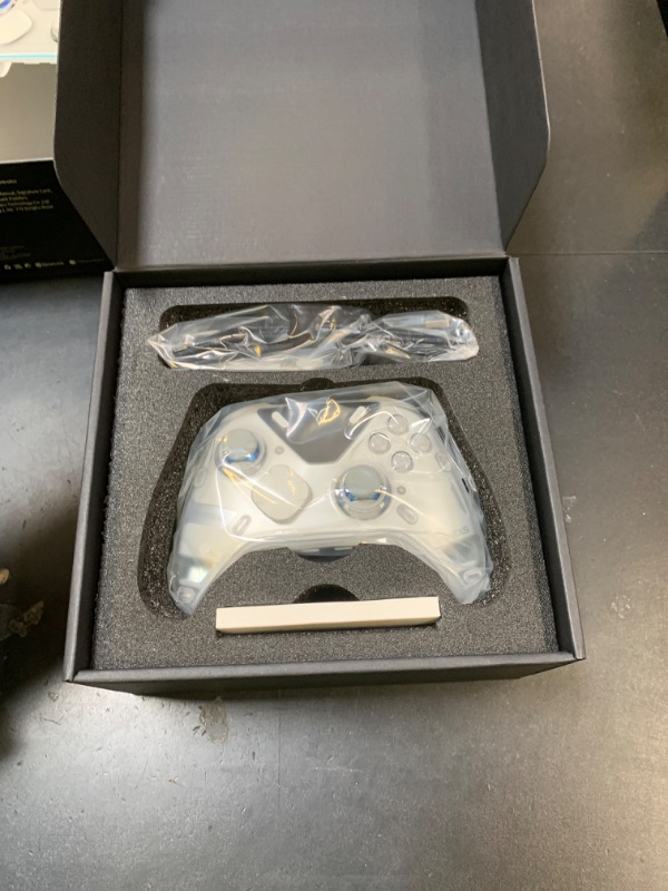 Photo 1 of FLYDIGI Apex 5 PC Controller, Forceflex Joystick 2.0, ForceAdapt Triggers, 3ms Ultra-Low Latency, RGB Light Bar, Full-Color LCD Display,1500mAh Battery PC/NS/Android/TV