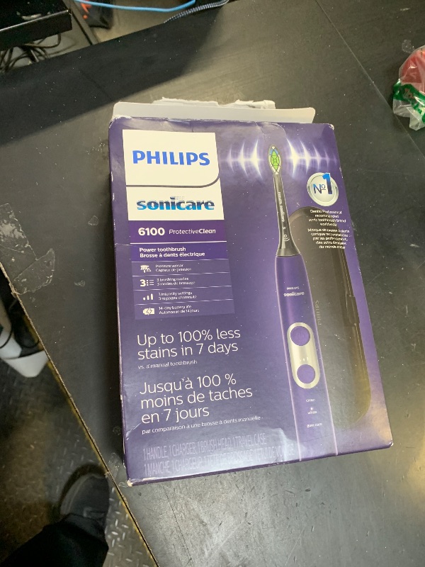 Photo 1 of Philips Sonicare ProtectiveClean 6100 Rechargeable Electric Toothbrush, with Pressure Sensor, 3 Cleaning Modes, SmarTimer and QuadPacer, 14-Day Battery Life, Travel Case, Deep Purple, Model HX6471/03