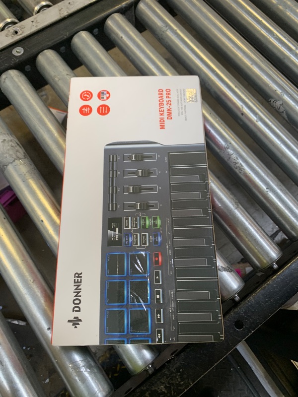 Photo 1 of Donner 25 Mini Key MIDI Keyboard Controller, Portable USB-C MIDI Keyboard with 8 Drum Pads, OLED Display, Music Production Software and 40 Teaching Courses, DMK25 Pro