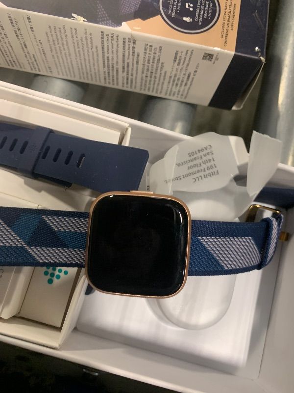 Photo 1 of **UNTESTED**
Fitbit Versa 2 Special Edition Health and Fitness Smart Watch with Heart Rate, Music, Alexa Built-In, Sleep and Swim Tracking, Navy and Pink Woven/Copper Rose, One Size (S and L Bands Included), 2.3