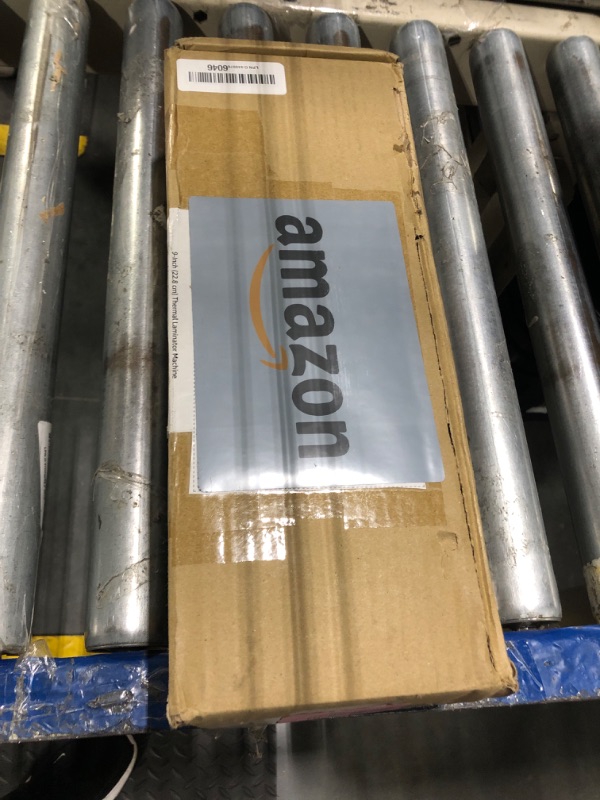 Photo 1 of ***LAMINATED PAPER STUCK IN MACHINE***FINALE SALE / NO RETURNS / NO REFUNDS*** Amazon Basics 9-Inch Thermal Laminator Machine with Quick Warm-Up, 2 Heat Settings, Jam Release for Documents and Photos, White
