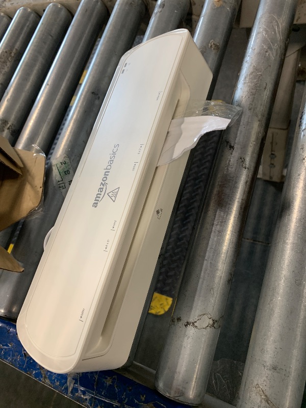Photo 1 of ***LAMINATED PAPER STUCK IN MACHINE***FINALE SALE / NO RETURNS / NO REFUNDS*** Amazon Basics 9-Inch Thermal Laminator Machine with Quick Warm-Up, 2 Heat Settings, Jam Release for Documents and Photos, White