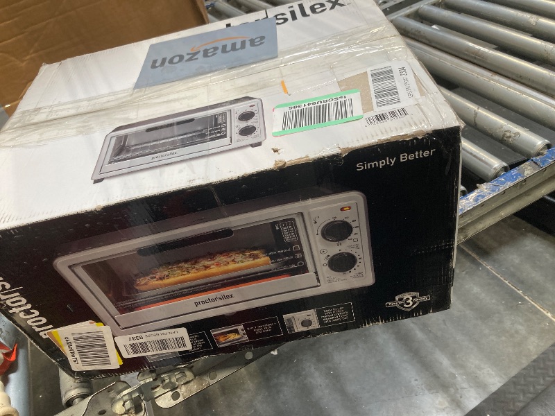 Photo 1 of **UNTESTED**
Proctor Silex 4 Slice Countertop Toaster Oven, Multi-Function with Bake, Toast and Broiler, 1100 Watts, 30 min timer and auto-shutoff, Includes Backing Pan and Rack, Black and Silver (31260)