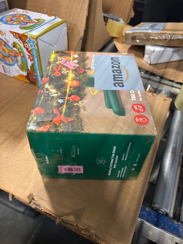 Photo 1 of ?Patent Pending? Musical Rotating Christmas Tree Stand, UL Certified Up to 9ft 120 lb Artificial Christmas Tree with Speaker, Spinning Stand with Remote, Fit for 1.25-2" in Tree Poles - 800W