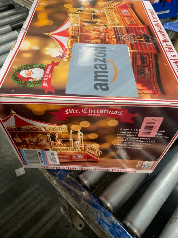 Photo 1 of **MAJOR DAMAGE**
Mr. Christmas Gold Label Animated and Musical Carousel, Christmas Decoration, LED Lights, Plays 50 Songs, 8 Inch, Red