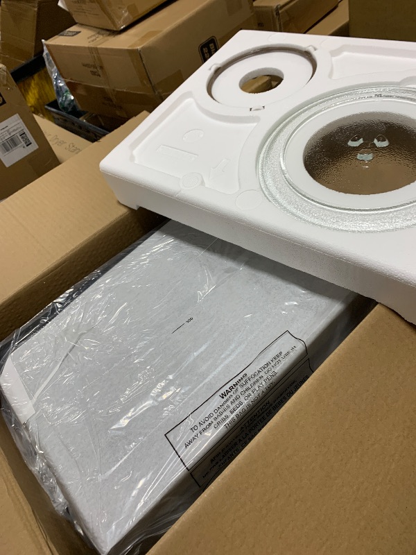 Photo 1 of Farberware 0.7 Cu. Ft. Countertop Microwave Oven – 700 Watts Power, Auto Cook Settings, Defrost, Easy Clean and Child Safety Lock - Stainless and Black