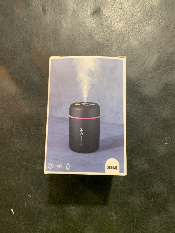 Photo 1 of Portable Mini Humidifier, 300ml USB Cool Mist Small Humidifier with Colorful Lights. Perfect for Bedroom, Office, Plants, travel & Car (White)