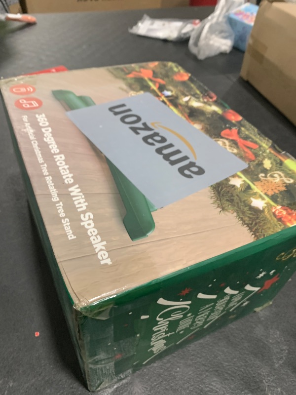 Photo 1 of ?Patent Pending? Musical Rotating Christmas Tree Stand, UL Certified Up to 9ft 120 lb Artificial Christmas Tree with Speaker, Spinning Stand with Remote, Fit for 1.25-2" in Tree Poles - 800W