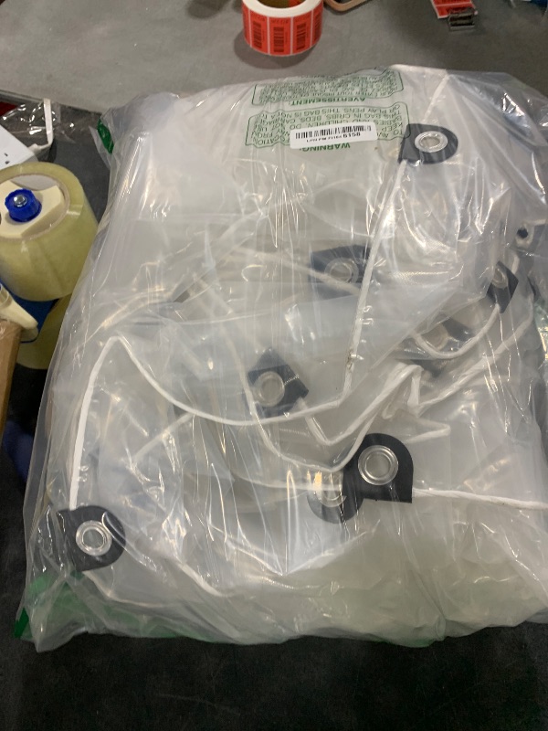 Photo 1 of 10x12ft Clear Waterproof Tarp with Grommets, Upgraded Edge Heat Fused Tear Resistant Clear Heavy Duty Tarps for Patio Fencing, Rain, Wind, Cold, Chicken Coops, and More?Windproof Rope+Tie-Downs?