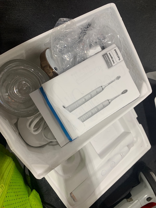 Photo 1 of Philips Sonicare DiamondClean Smart 9300 Electric Toothbrush, Sonic Toothbrush with App, Pressure Sensor, Brush Head Detection, 4 Brushing Modes and 3 Intensity Levels, Rosegold, Model HX9903/65