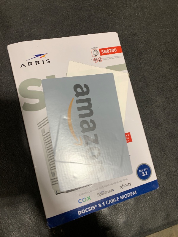 Photo 1 of ARRIS SURFboard SB8200 DOCSIS 3.1 Multi?Gig Cable Modem | 2 -1Gbps Ethernet Ports | Works with Xfinity, Cox, Spectrum | For Cable Internet Plans up to 2Gbps | Modem Only, Router Required